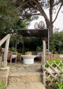 Part of my Mini-Writing Retreat: Covered seating at top of stairs in organic garden at the Inn at Moonlight Beach, Encinitas, CA